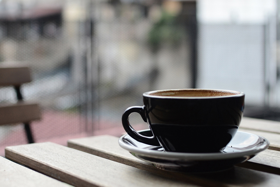 a cup of coffee on a table